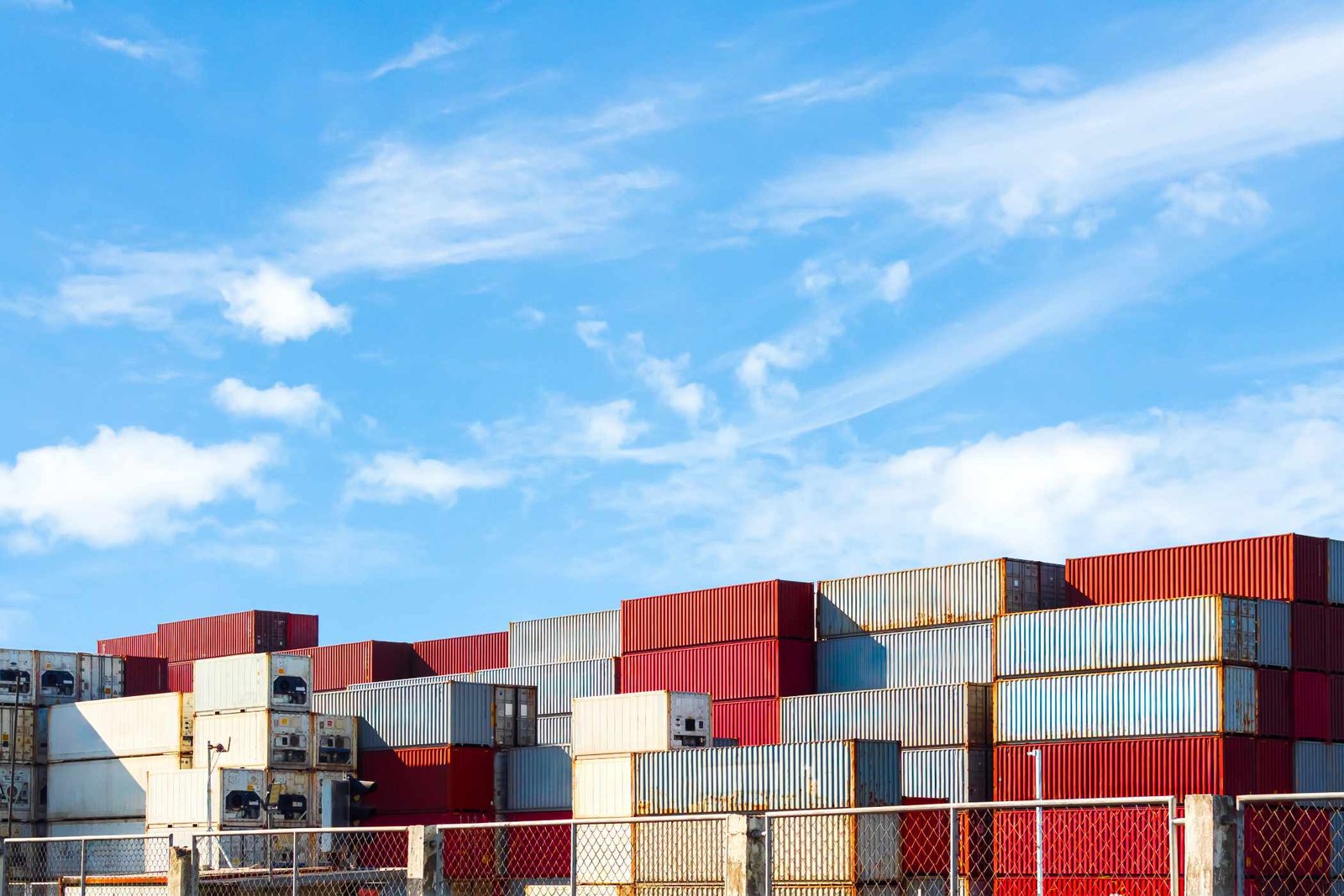 Stacked shipping containers at a port terminal